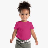 A young girl wearing a pink organic cotton T-shirt.
