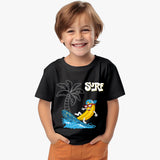 A child wearing a black organic cotton t-shirt with a graphic of a banana in a surf hat and the word 'SURF' on it.