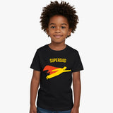 Child wearing a black t-shirt with 'SUPERDAD' graphic design on a white background