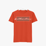 An orange crew neck t-shirt with the word 'Authenticity' printed across the front in a white rectangular box.