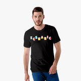 A man wearing a black graphic t-shirt with the word 'ECSTATIC' written in colorful letters on the front.