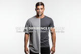 Man wearing a gray t-shirt with text about custom fit t-shirts on a white background